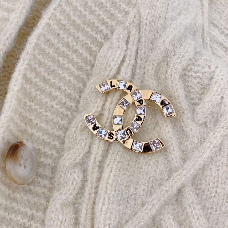 Ch*el brooches